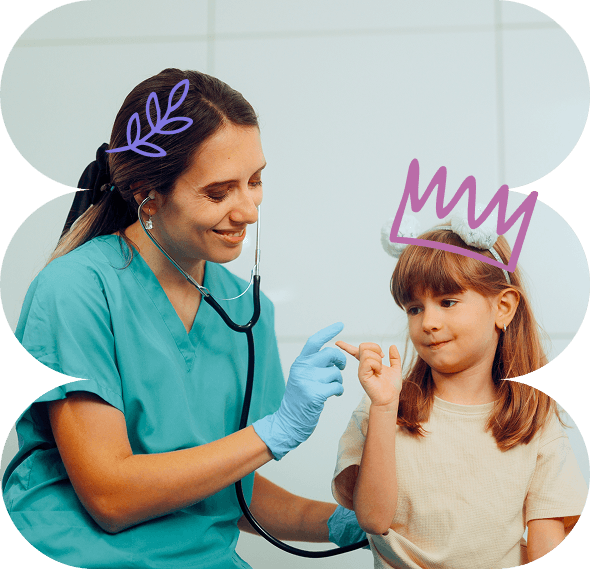 A smiling healthcare worker listens to a young girl’s heartbeat with a stethoscope. Both wear playful, drawn-on crowns, and the girl holds up her little finger. The background is a medical surgery, capturing the caring spirit of Galway’s Sick Kids.